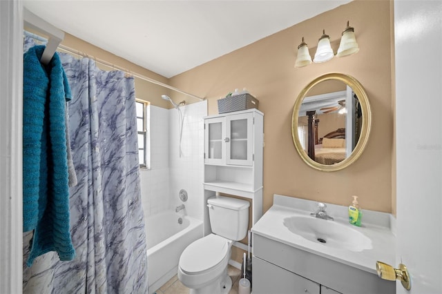 full bathroom with vanity, toilet, shower / tub combo, and tile patterned flooring