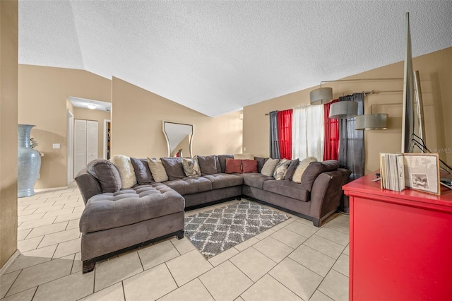 tiled living room featuring vaulted ceiling and a textured ceiling