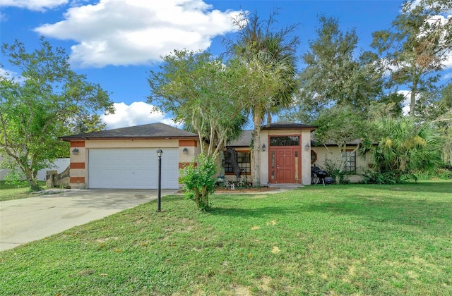 view of front of home featuring a front yard and a garage