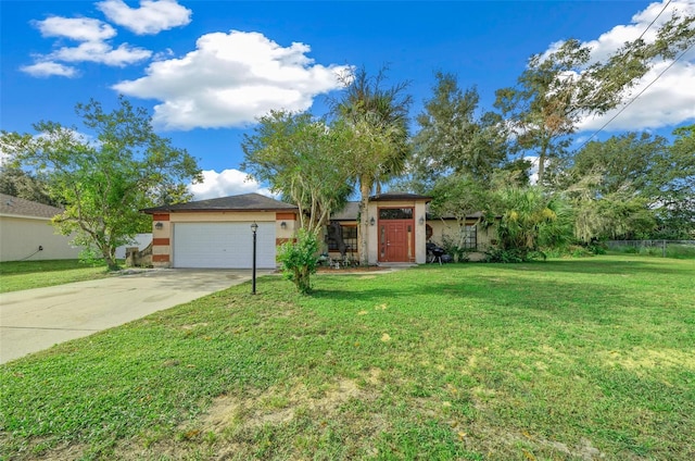 view of front facade with a front yard and a garage