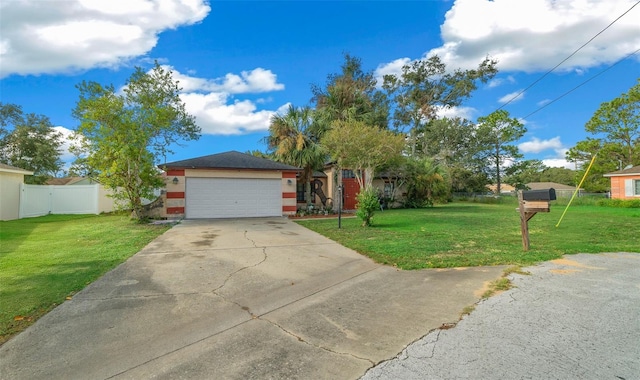 view of front facade featuring a front lawn and a garage