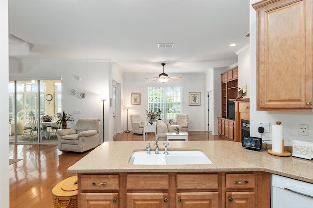 kitchen featuring sink, light hardwood / wood-style flooring, crown molding, white dishwasher, and ceiling fan