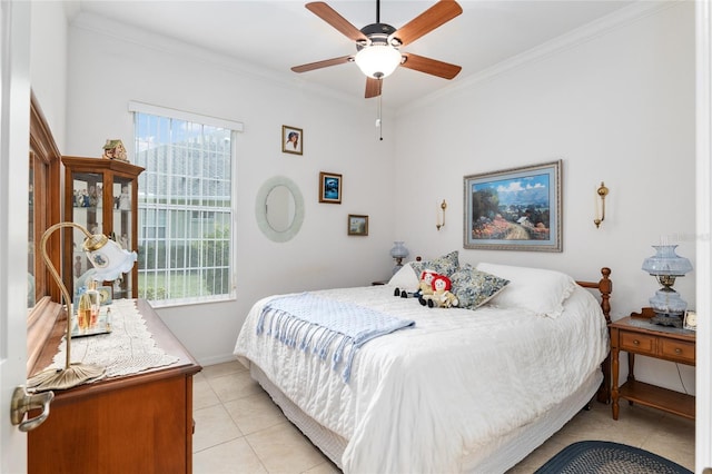 bedroom featuring ceiling fan, light tile patterned floors, and crown molding