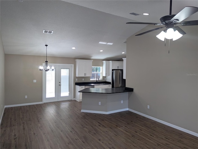 kitchen with white cabinetry, french doors, sink, hanging light fixtures, and stainless steel appliances