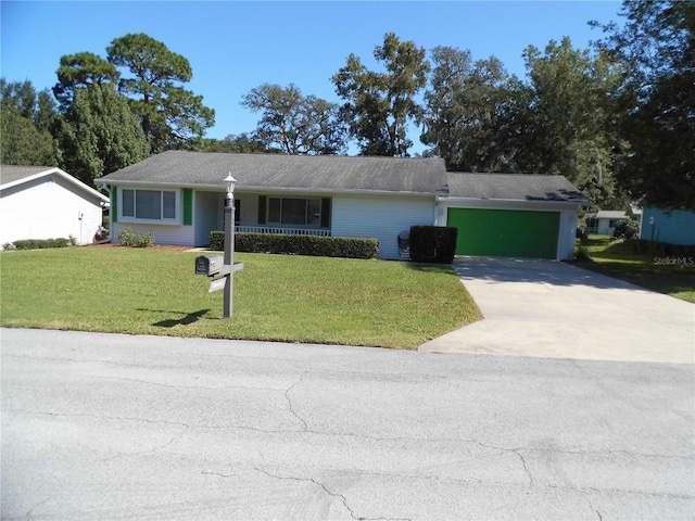 single story home with a garage, a porch, and a front lawn