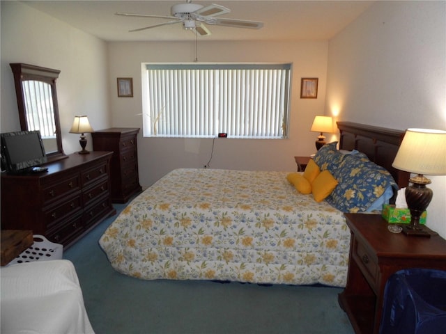 bedroom with ceiling fan and carpet floors