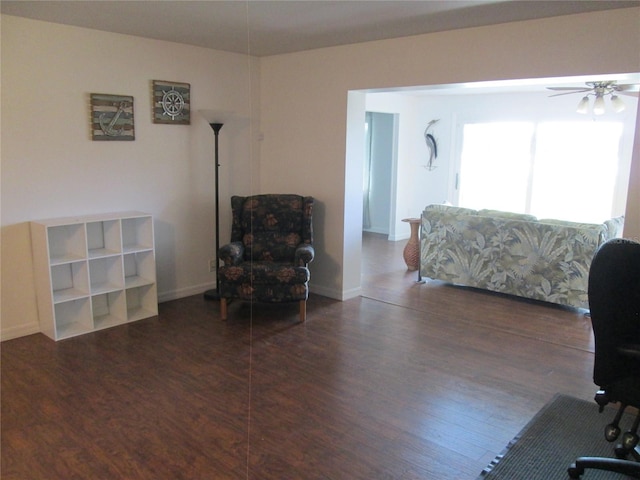 interior space featuring dark hardwood / wood-style flooring and ceiling fan