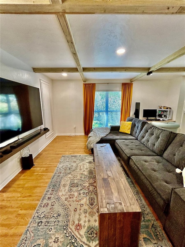 living room featuring hardwood / wood-style floors and a textured ceiling