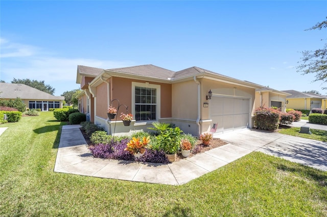 view of front facade featuring a front lawn and a garage