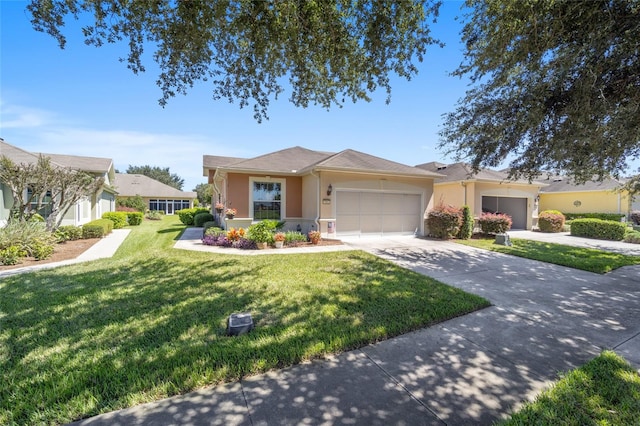 view of front of property featuring a front yard and a garage