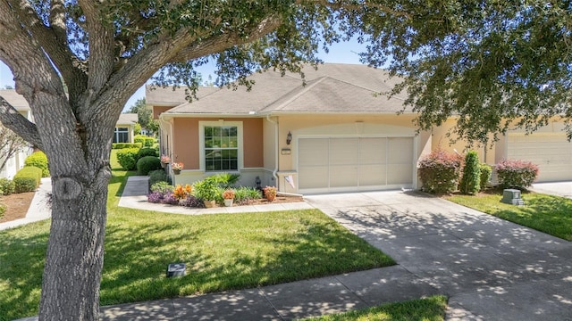 ranch-style house featuring a front yard and a garage