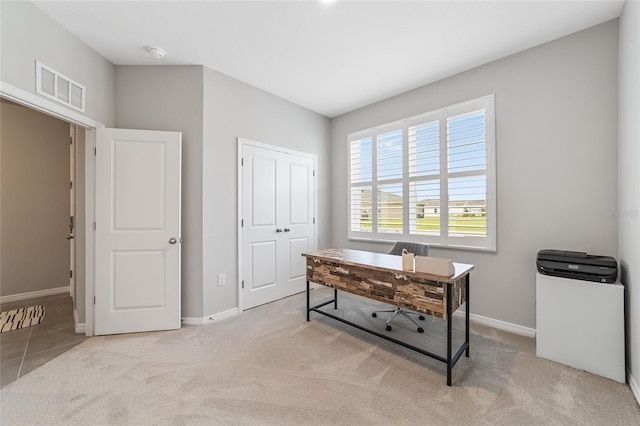 view of carpeted home office