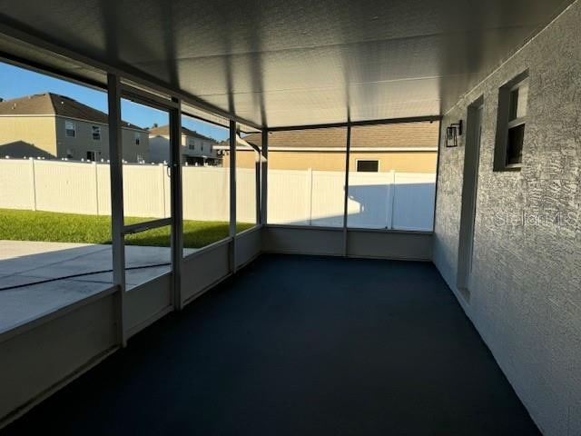 view of unfurnished sunroom