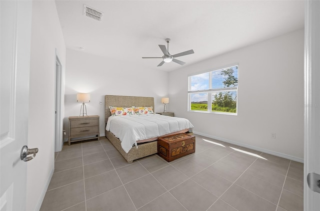 bedroom featuring ceiling fan and light tile patterned floors