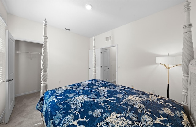 bedroom featuring a closet and carpet flooring