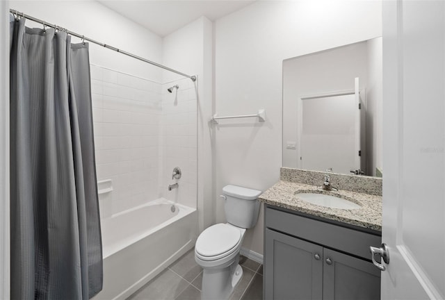 full bathroom featuring toilet, vanity, tile patterned floors, and shower / bathtub combination with curtain