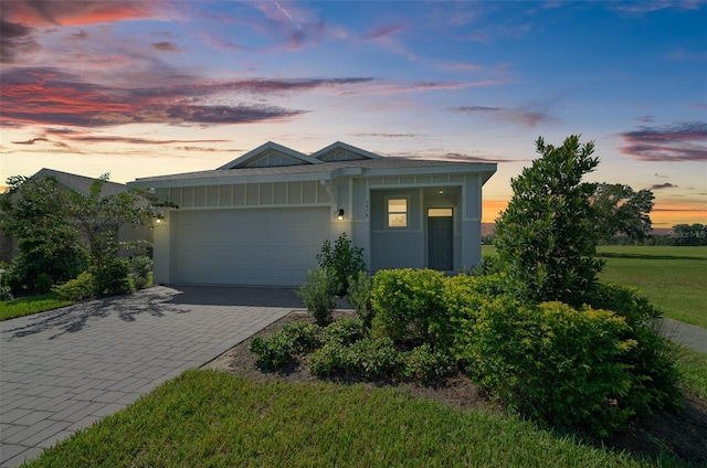 view of front of home with a garage