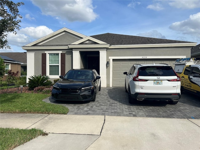 ranch-style house with a garage