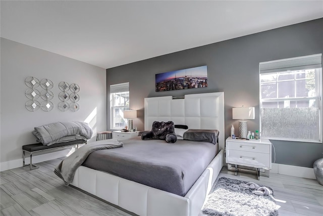 bedroom featuring light hardwood / wood-style floors