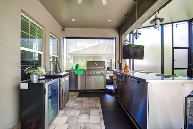 kitchen featuring pendant lighting and kitchen peninsula