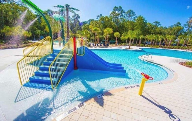 view of pool with a patio