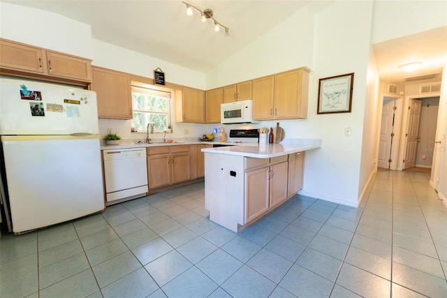 kitchen featuring high vaulted ceiling, white appliances, kitchen peninsula, light tile patterned floors, and sink