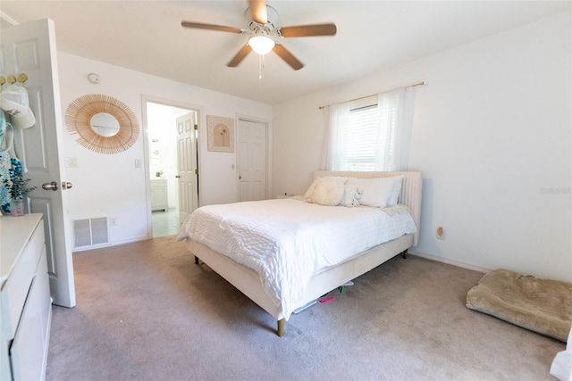 bedroom with ceiling fan and carpet