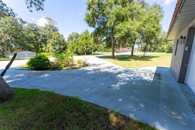 view of patio featuring a garage