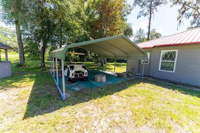 view of yard with a carport