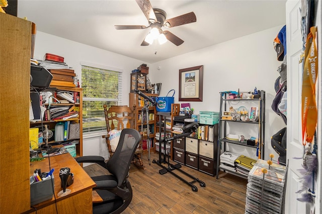 office space with ceiling fan and dark wood-type flooring