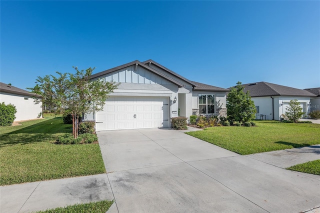 single story home with a front yard and a garage