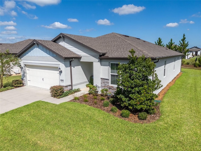 ranch-style house featuring a garage and a front yard