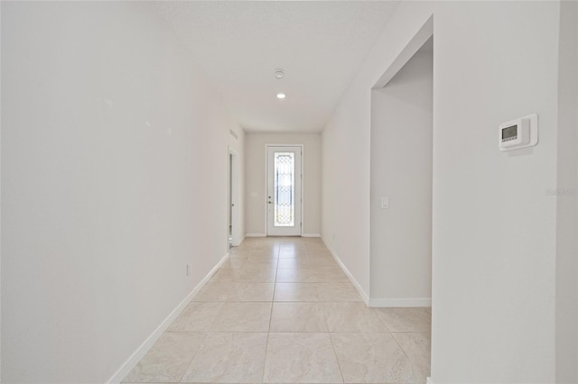 interior space with light tile patterned floors