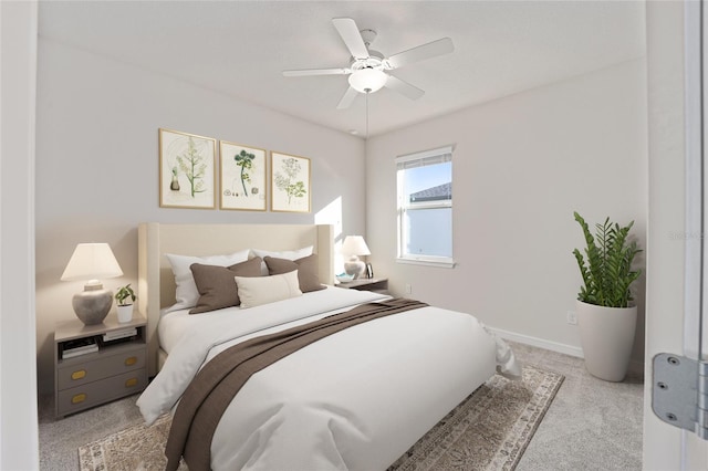 bedroom with light colored carpet and ceiling fan