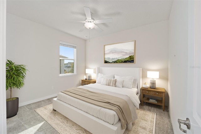 bedroom featuring light carpet and ceiling fan