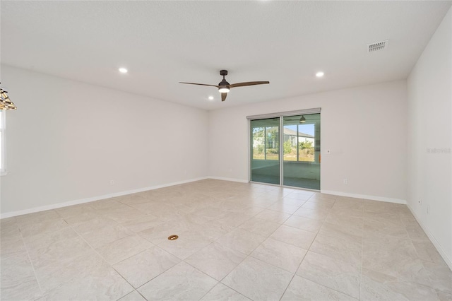 spare room with ceiling fan