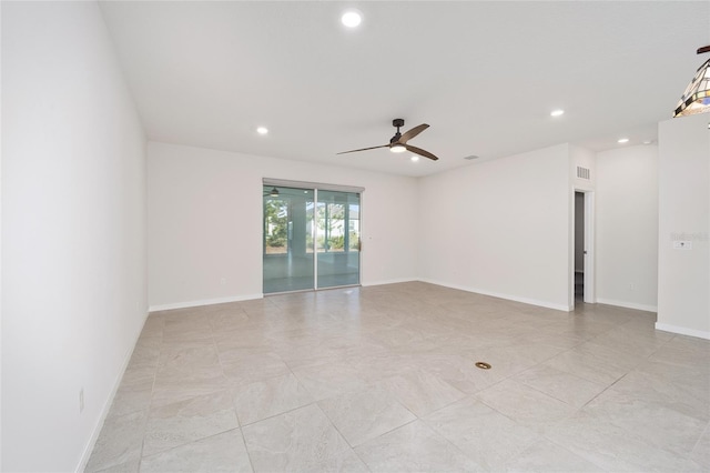 spare room featuring ceiling fan