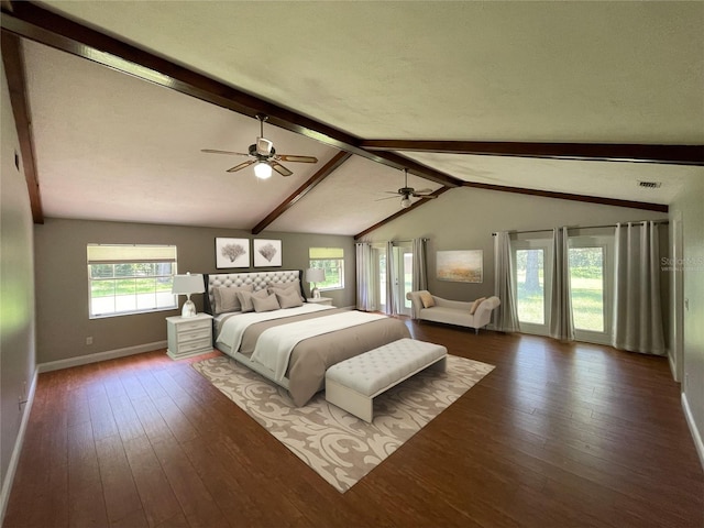 bedroom featuring ceiling fan, hardwood / wood-style floors, lofted ceiling with beams, and a textured ceiling