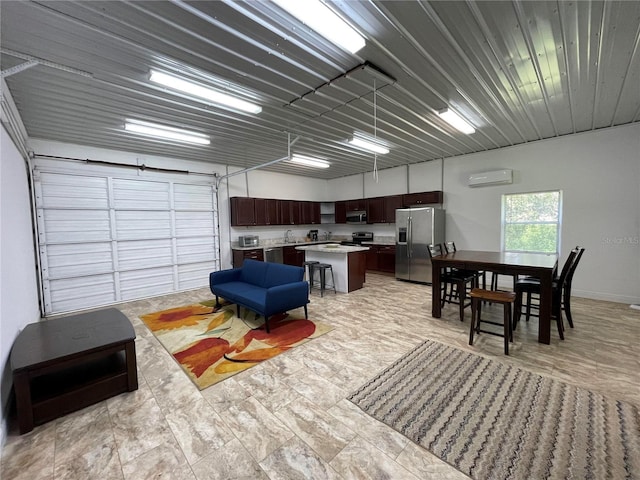 9526 SW 72nd Ct, Ocala, FL 34476 - interior space featuring stainless steel fridge with ice dispenser and a wall mounted AC