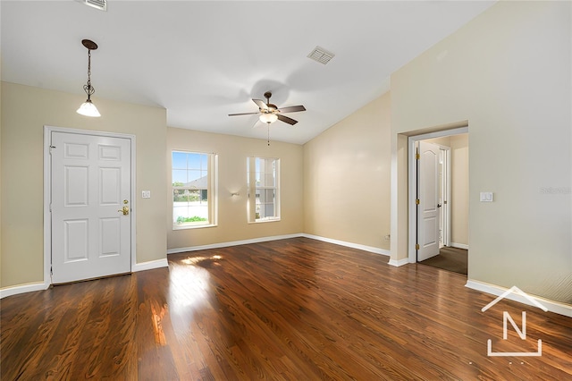 entrance foyer with ceiling fan, vaulted ceiling, dark wood-style floors, and baseboards