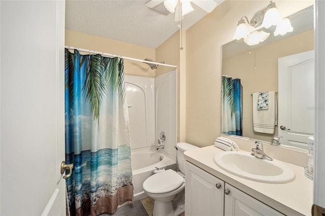 bathroom with a textured ceiling, ceiling fan, toilet, shower / bath combo, and vanity