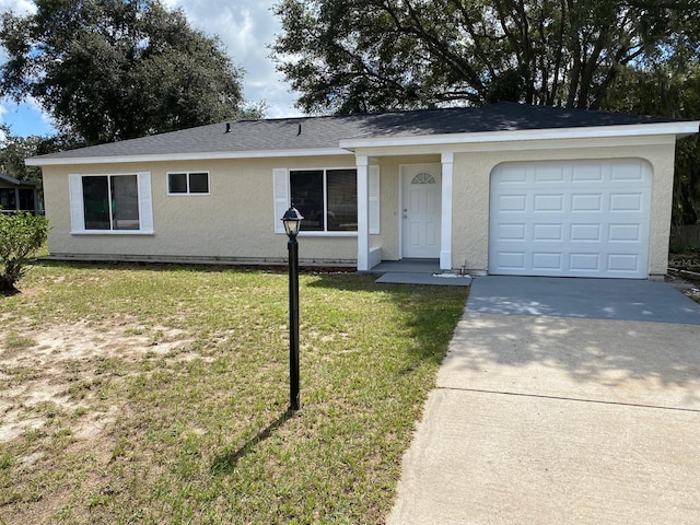 ranch-style house featuring a front yard