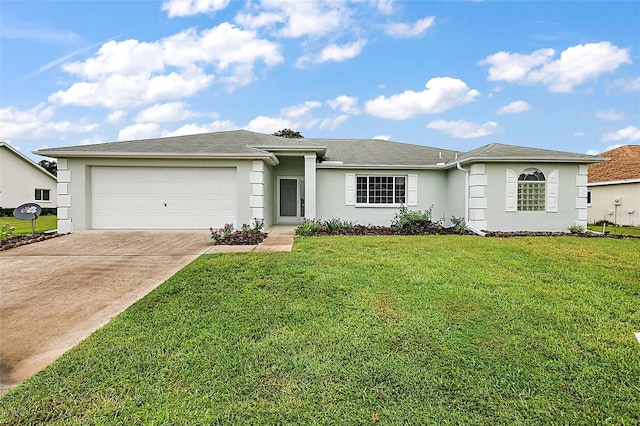 ranch-style house featuring a front lawn and a garage