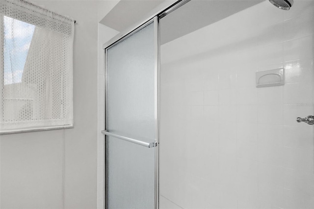 bathroom with walk in shower