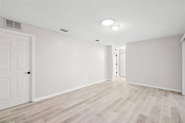 2051 NW 50th Ave, Ocala, FL 34482 - unfurnished room featuring light wood-type flooring, baseboards, and visible vents