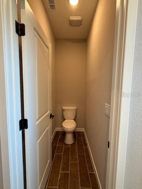 bathroom featuring toilet