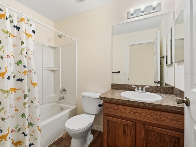 full bathroom with vanity, toilet, wood-type flooring, and shower / tub combo with curtain