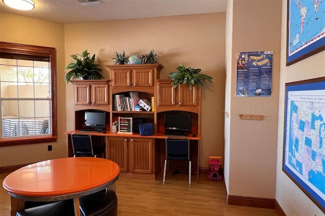 office space featuring light hardwood / wood-style flooring