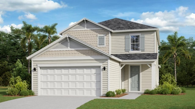 view of front of home with a garage and a front yard