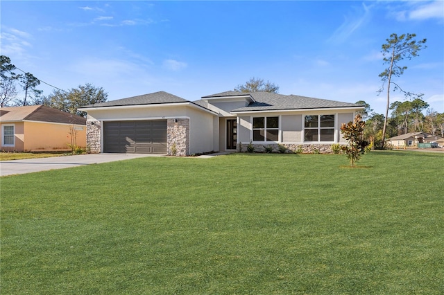 view of front facade with a garage and a front yard